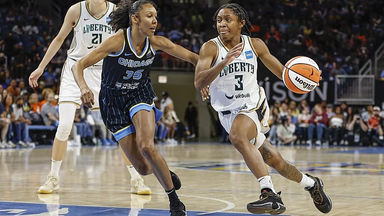 Aug 20, 2022; Chicago, Illinois, USA; New York Liberty guard Crystal Dangerfield (3) drives to the basket against Chicago Sky guard Rebekah Gardner (35) during the second half of Game 2 of the first round of the WNBA playoffs at Wintrust Arena. Mandatory Credit: Kamil Krzaczynski-USA TODAY Sports