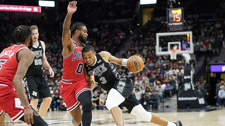 Oct 28, 2022; San Antonio, Texas, USA; San Antonio Spurs forward Keldon Johnson (3) drives to the basket against the Chicago Bulls guard Coby White (00) during the second half at AT&T Center. Mandatory Credit: Scott Wachter-USA TODAY Sports