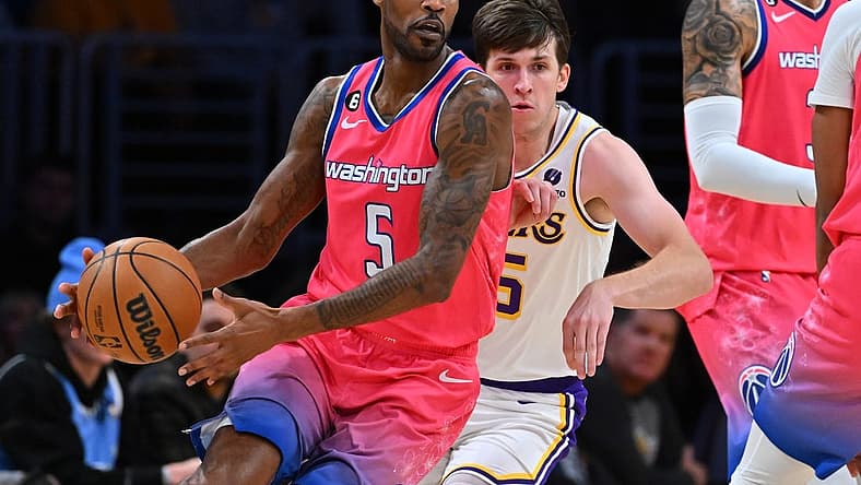 Dec 18, 2022; Los Angeles, California, USA; Los Angeles Lakers guard Austin Reaves (15) chases down Washington Wizards forward Will Barton (5) in the first half at Crypto.com Arena. Mandatory Credit: Jayne Kamin-Oncea-USA TODAY Sports