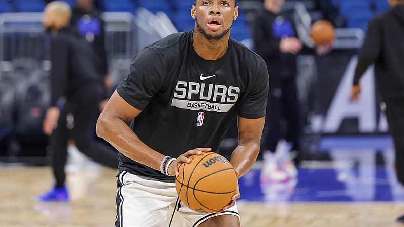 Dec 23, 2022; Orlando, Florida, USA; San Antonio Spurs center Charles Bassey (28) warms up before the game against the Orlando Magic at Amway Center. Mandatory Credit: Mike Watters-USA TODAY Sports