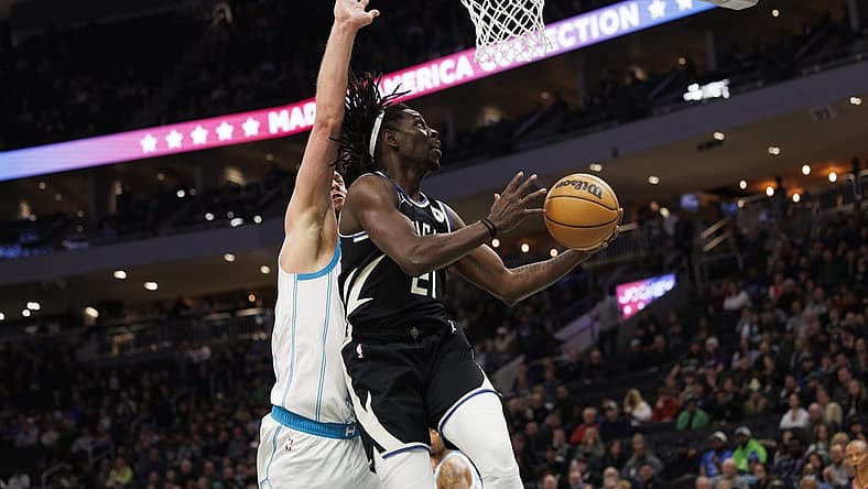 Jan 31, 2023; Milwaukee, Wisconsin, USA;  Milwaukee Bucks guard Jrue Holiday (21) shoots during the first quarter against the Charlotte Hornets at Fiserv Forum. Mandatory Credit: Jeff Hanisch-USA TODAY Sports