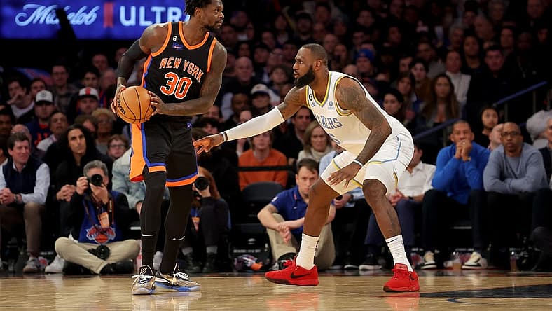 Jan 31, 2023; New York, New York, USA; New York Knicks forward Julius Randle (30) controls the ball against Los Angeles Lakers forward LeBron James (6) during the fourth quarter at Madison Square Garden. Mandatory Credit: Brad Penner-USA TODAY Sports