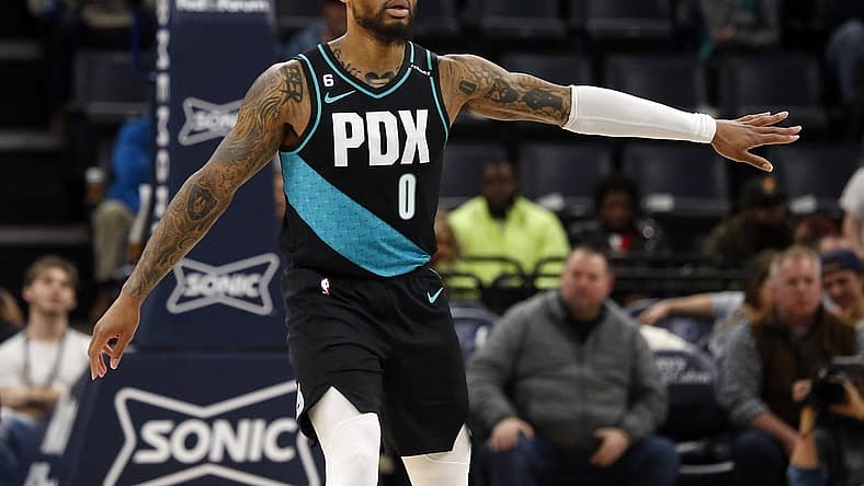 Feb 1, 2023; Memphis, Tennessee, USA; Portland Trail Blazers guard Damian Lillard (0) reacts after a basket during the first half against the Memphis Grizzlies at FedExForum. Mandatory Credit: Petre Thomas-USA TODAY Sports