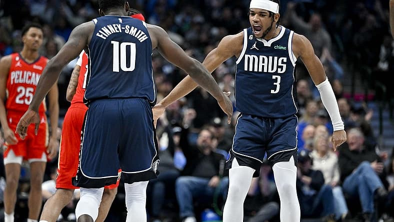 Feb 2, 2023; Dallas, Texas, USA; Dallas Mavericks forward Dorian Finney-Smith (10) and guard Jaden Hardy (3) celebrate during the first half of the game against the New Orleans Pelicans at the American Airlines Center. Mandatory Credit: Jerome Miron-USA TODAY Sports