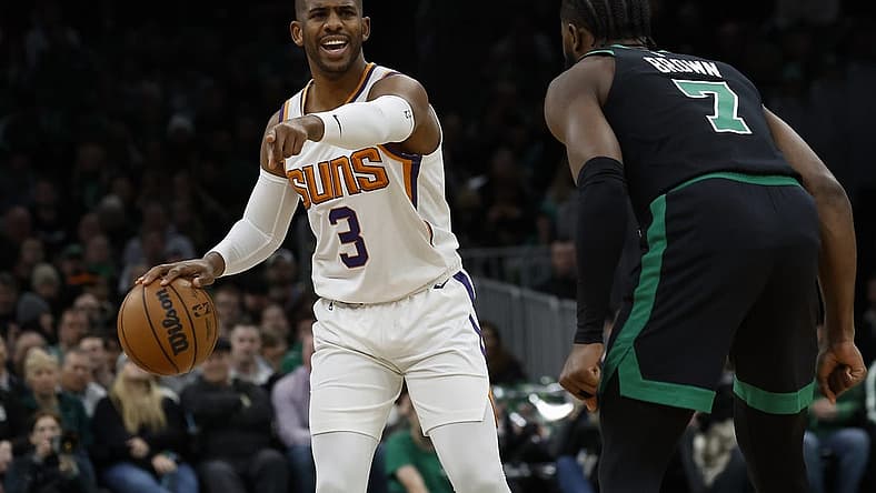 Feb 3, 2023; Boston, Massachusetts, USA; Phoenix Suns guard Chris Paul (3) directs teammates against the Boston Celtics during the first quarter at TD Garden. Mandatory Credit: Winslow Townson-USA TODAY Sports