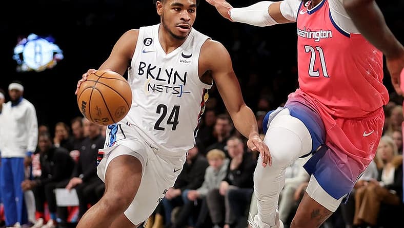 Feb 4, 2023; Brooklyn, New York, USA; Brooklyn Nets guard Cam Thomas (24) drives to the basket against Washington Wizards center Daniel Gafford (21) during the first quarter at Barclays Center. Mandatory Credit: Brad Penner-USA TODAY Sports