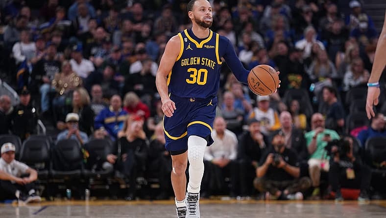 Feb 4, 2023; San Francisco, California, USA; Golden State Warriors guard Stephen Curry (30) dribbles the ball against the Dallas Mavericks in the third quarter at the Chase Center. Mandatory Credit: Cary Edmondson-USA TODAY Sports