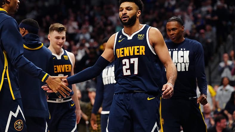 Feb 4, 2023; Denver, Colorado, USA; Denver Nuggets guard Jamal Murray (27) celebrates a play in the fourth quarter against the Atlanta Hawks at Ball Arena. Mandatory Credit: Ron Chenoy-USA TODAY Sports