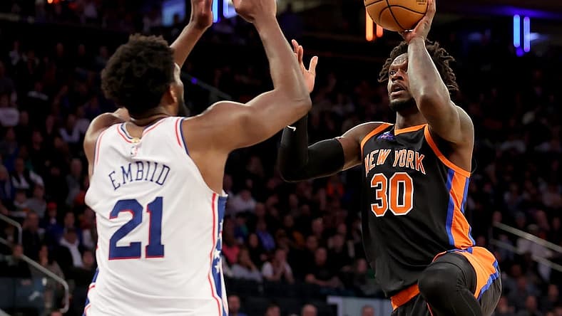 Feb 5, 2023; New York, New York, USA; New York Knicks forward Julius Randle (30) takes a shot against Philadelphia 76ers center Joel Embiid (21) during the fourth quarter at Madison Square Garden. Mandatory Credit: Brad Penner-USA TODAY Sports