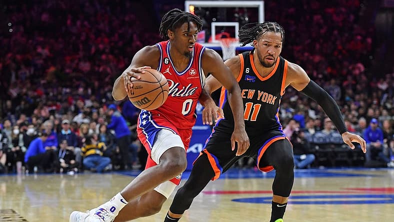Feb 10, 2023; Philadelphia, Pennsylvania, USA; Philadelphia 76ers guard Tyrese Maxey (0) drives to the basket against New York Knicks guard Jalen Brunson (11) during the third quarter at Wells Fargo Center. Mandatory Credit: Eric Hartline-USA TODAY Sports