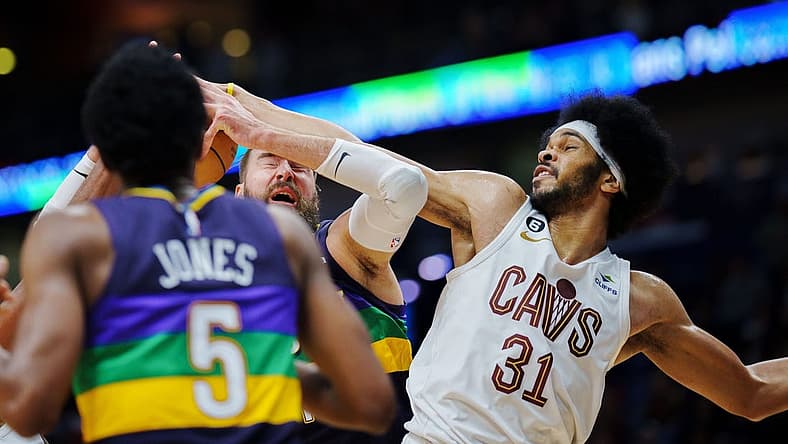 Feb 10, 2023; New Orleans, Louisiana, USA; New Orleans Pelicans center Jonas Valanciunas (17) gets hit in the face by Cleveland Cavaliers center Jarrett Allen (31) during the fourth quarter at Smoothie King Center. Mandatory Credit: Andrew Wevers-USA TODAY Sports