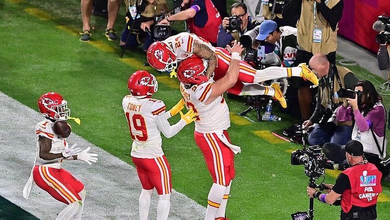 Feb 12, 2023; Glendale, Arizona, US; Kansas City Chiefs wide receiver Skyy Moore (24) celebrates with center Creed Humphrey (52) and wide receiver Kadarius Toney (19) and running back Jerick McKinnon (1) after scoring a touchdown against the Philadelphia Eagles during the fourth quarter of Super Bowl LVII at State Farm Stadium. Mandatory Credit: Matt Kartozian-USA TODAY Sports