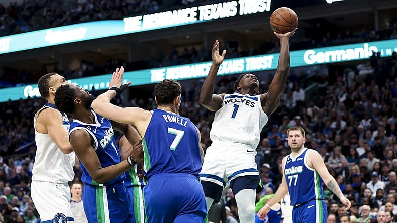 Feb 13, 2023; Dallas, Texas, USA; Minnesota Timberwolves guard Anthony Edwards (1) shoots during the second quarter against the Dallas Mavericks at American Airlines Center. Mandatory Credit: Kevin Jairaj-USA TODAY Sports