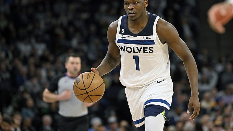 Feb 16, 2023; Minneapolis, Minnesota, USA; Minnesota Timberwolves guard Anthony Edwards (1) brings the ball up-court against the Washington Wizards during the second quarter at Target Center. Mandatory Credit: Nick Wosika-USA TODAY Sports
