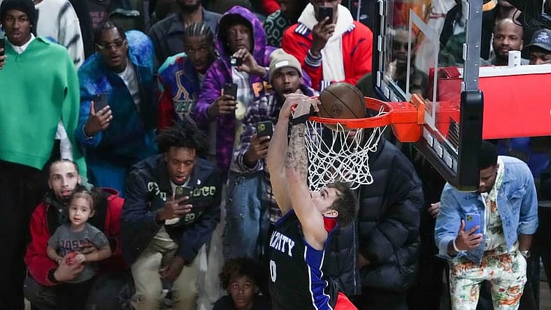 Feb 18, 2023; Salt Lake City, UT, USA; Philadelphia 76ers guard Mac McClung (9) dunks in the Dunk Contest during the 2023 All Star Saturday Night at Vivint Arena. Mandatory Credit: Kirby Lee-USA TODAY Sports