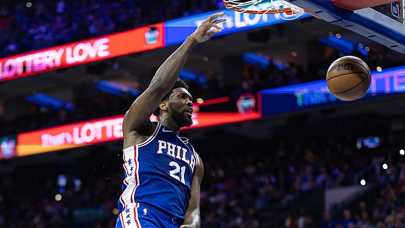 Feb 23, 2023; Philadelphia, Pennsylvania, USA; Philadelphia 76ers center Joel Embiid (21) dunks the ball against the Memphis Grizzlies during the first quarter at Wells Fargo Center. Mandatory Credit: Bill Streicher-USA TODAY Sports