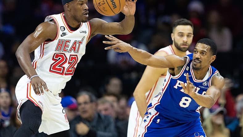 Feb 27, 2023; Philadelphia, Pennsylvania, USA; Philadelphia 76ers guard De'Anthony Melton (8) passes the ball past Miami Heat forward Jimmy Butler (22) during the first quarter at Wells Fargo Center. Mandatory Credit: Bill Streicher-USA TODAY Sports