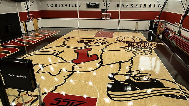 The new image of the cardinal mascot dunking has been completed on the floor of the U of L basketball practice facility on Floyd Street. May 15, 2019
T9i1136 Uofl Logo