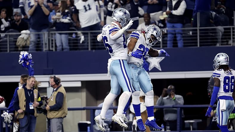 Dec 11, 2022; Arlington, Texas, USA; Dallas Cowboys running back Tony Pollard (20) celebrates with Dallas Cowboys tight end Dalton Schultz (86) after scoring a touchdown during the first half at AT&T Stadium. Mandatory Credit: Kevin Jairaj-USA TODAY Sports