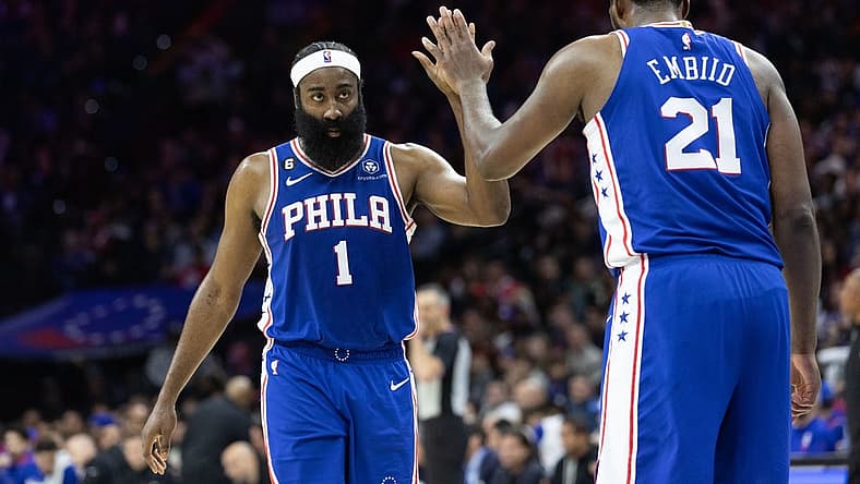 Feb 23, 2023; Philadelphia, Pennsylvania, USA; Philadelphia 76ers guard James Harden (1) and center Joel Embiid (21) high five after a score against the Memphis Grizzlies during the fourth quarter at Wells Fargo Center. Mandatory Credit: Bill Streicher-USA TODAY Sports