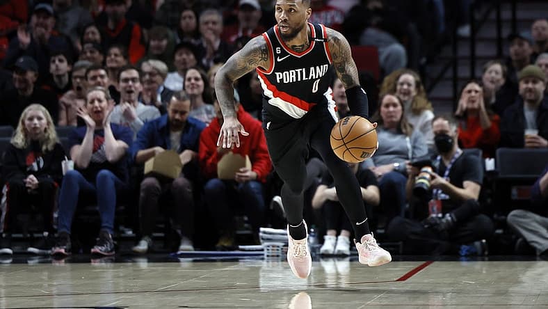 Feb 26, 2023; Portland, Oregon, USA; Portland Trail Blazers point guard Damian Lillard (0) dribbles the ball on a fast break during the first half against the Houston Rockets at Moda Center. Mandatory Credit: Soobum Im-USA TODAY Sports
