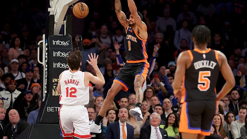 Mar 1, 2023; New York, New York, USA; New York Knicks forward Obi Toppin (1) dunks against Brooklyn Nets forward Joe Harris (12) during the second quarter at Madison Square Garden. Mandatory Credit: Brad Penner-USA TODAY Sports