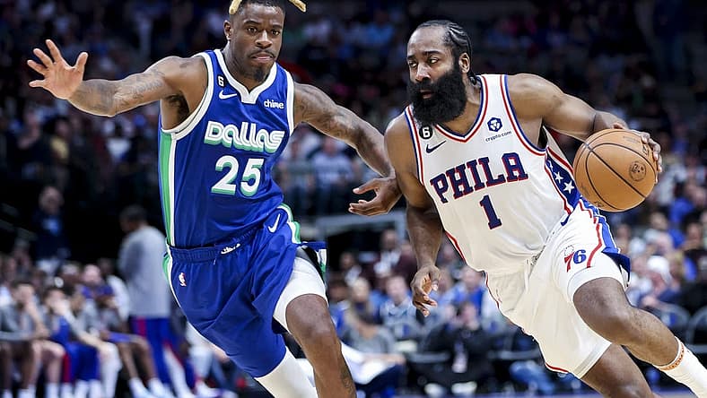 Mar 2, 2023; Dallas, Texas, USA;  Philadelphia 76ers guard James Harden (1) drives to the basket as Dallas Mavericks forward Reggie Bullock (25) defends during the second half at American Airlines Center. Mandatory Credit: Kevin Jairaj-USA TODAY Sports