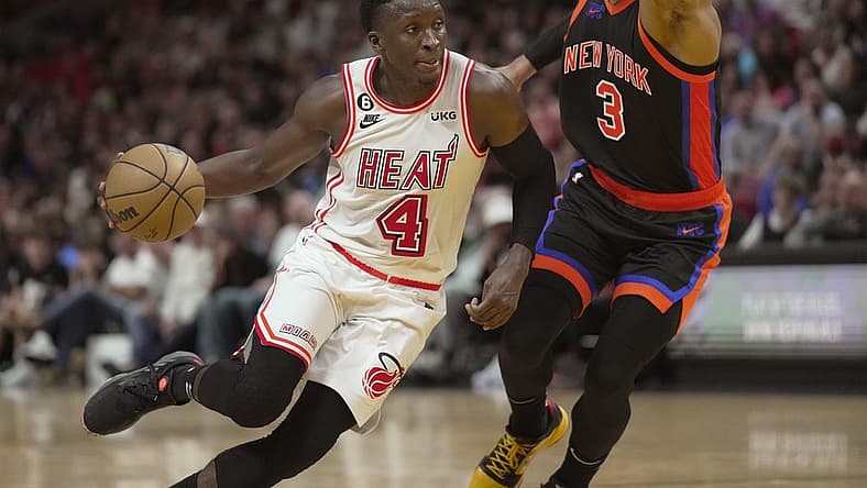 Mar 3, 2023; Miami, Florida, USA; Miami Heat guard Victor Oladipo (4) drives to the basket past New York Knicks guard Josh Hart (3) during the second half at Miami-Dade Arena. Mandatory Credit: Jim Rassol-USA TODAY Sports