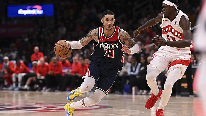 Mar 4, 2023; Washington, District of Columbia, USA; Washington Wizards forward Kyle Kuzma (33) makes a move to the basket as Toronto Raptors forward Pascal Siakam (43) defends during the during over time at Capital One Arena. Mandatory Credit: Tommy Gilligan-USA TODAY Sports