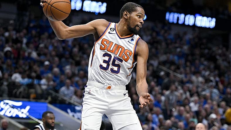 Mar 5, 2023; Dallas, Texas, USA; Phoenix Suns forward Kevin Durant (35) grabs a rebound against the Dallas Mavericks during the second half at the American Airlines Center. Mandatory Credit: Jerome Miron-USA TODAY Sports