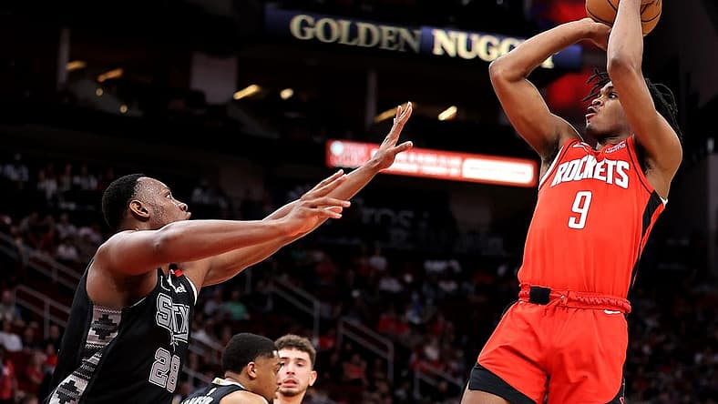 Mar 5, 2023; Houston, Texas, USA; Houston Rockets guard Josh Christopher (9) shoots against San Antonio Spurs center Charles Bassey (28) during the second quarter at Toyota Center. Mandatory Credit: Erik Williams-USA TODAY Sports