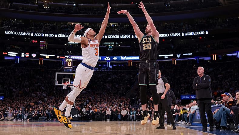 Mar 7, 2023; New York, New York, USA; Charlotte Hornets forward Gordon Hayward (20) shoots the ball against the New York Knicks against New York Knicks guard Josh Hart (3) during the first half at Madison Square Garden. Mandatory Credit: Vincent Carchietta-USA TODAY Sports