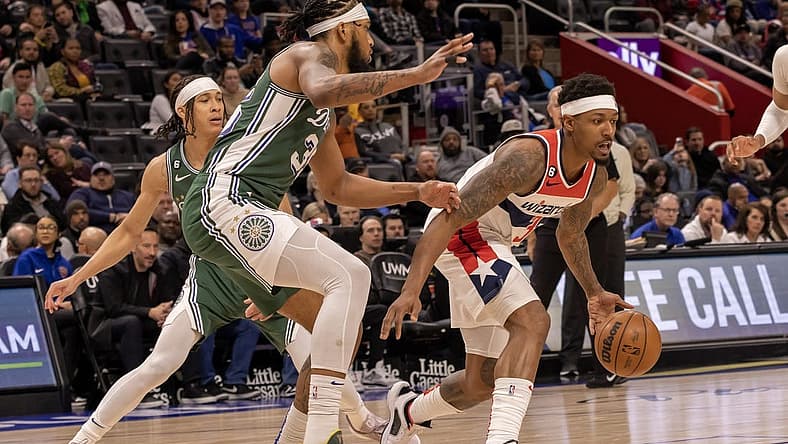 Mar 7, 2023; Detroit, Michigan, USA; Washington Wizards guard Bradley Beal (3) controls the ball in front of Detroit Pistons forward Marvin Bagley III (35) in the first quarter at Little Caesars Arena. Mandatory Credit: David Reginek-USA TODAY Sports