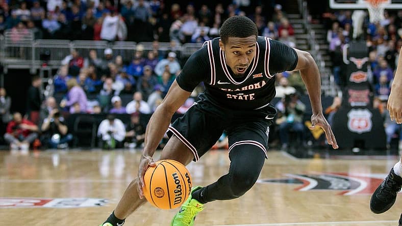Mar 9, 2023; Kansas City, MO, USA; Oklahoma State Cowboys guard Bryce Thompson (1) drives to the basket during the second half against the Texas Longhorns at T-Mobile Center. Mandatory Credit: William Purnell-USA TODAY Sports