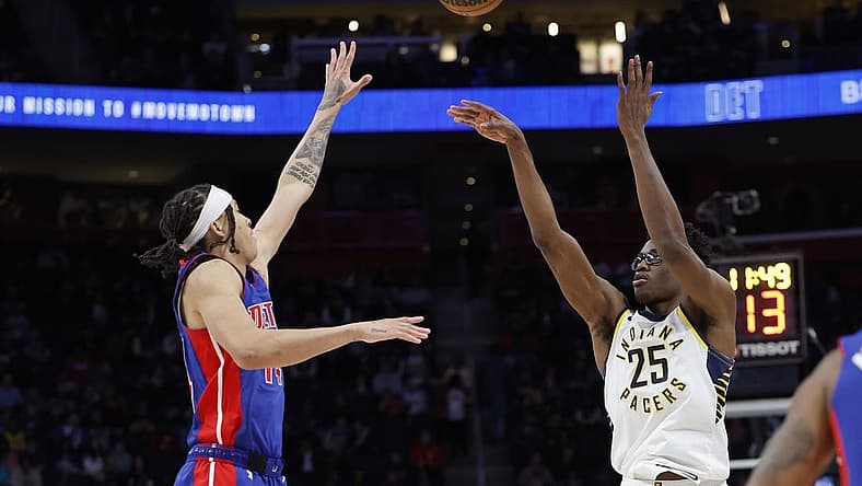 Mar 11, 2023; Detroit, Michigan, USA; Indiana Pacers forward Jalen Smith (25) shoots the ball against Detroit Pistons guard R.J. Hampton (14) in the second half at Little Caesars Arena. Mandatory Credit: Rick Osentoski-USA TODAY Sports