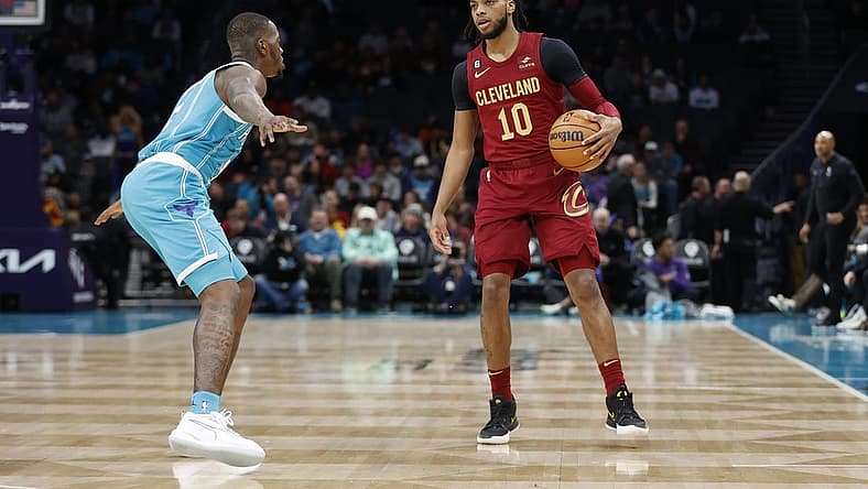 Mar 12, 2023; Charlotte, North Carolina, USA; Cleveland Cavaliers guard Darius Garland (10) is guarded by Charlotte Hornets guard Terry Rozier (3) during the first half at Spectrum Center. Mandatory Credit: Brian Westerholt-USA TODAY Sports