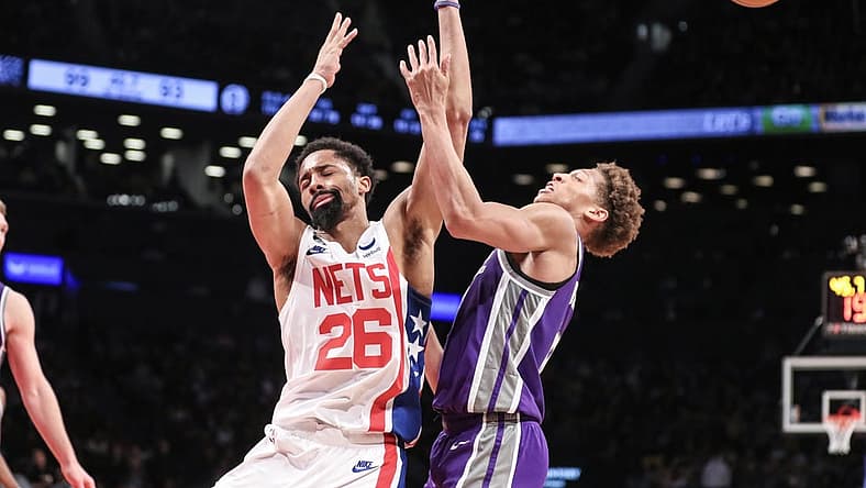 Mar 16, 2023; Brooklyn, New York, USA; Brooklyn Nets guard Spencer Dinwiddie (26) collides with Sacramento Kings forward Kessler Edwards (17) in the fourth quarter at Barclays Center. Mandatory Credit: Wendell Cruz-USA TODAY Sports