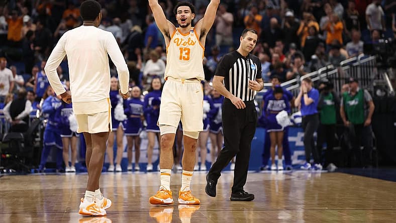Mar 18, 2023; Orlando, FL, USA; Tennessee Volunteers forward Olivier Nkamhoua (13) celebrates after defeating the Duke Blue Devils in the second round of the 2023 NCAA Tournament at Legacy Arena. Mandatory Credit: Matt Pendleton-USA TODAY Sports