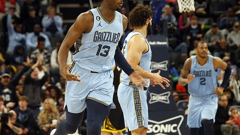 Mar 18, 2023; Memphis, Tennessee, USA; Memphis Grizzlies forward Jaren Jackson Jr. (13) reacts after a basket during the second half against the Golden State Warriors at FedExForum. Mandatory Credit: Petre Thomas-USA TODAY Sports