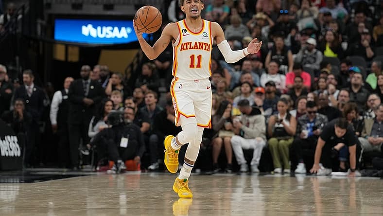 Mar 19, 2023; San Antonio, Texas, USA; Atlanta Hawks guard Trae Young (11) dribbles the ball up the court in the second half against the San Antonio Spurs at the AT&T Center. Mandatory Credit: Daniel Dunn-USA TODAY Sports