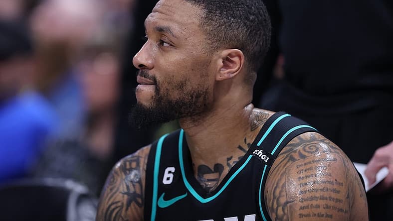 Mar 22, 2023; Salt Lake City, Utah, USA; Portland Trail Blazers guard Damian Lillard (0) looks on during a time out against the Utah Jazz in the third quarter at Vivint Arena. Mandatory Credit: Rob Gray-USA TODAY Sports