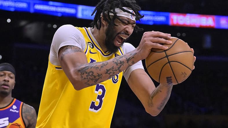 Mar 22, 2023; Los Angeles, California, USA; Los Angeles Lakers forward Anthony Davis (3) reacts after he was called for a foul in the second half against the Phoenix Suns at Crypto.com Arena. Mandatory Credit: Jayne Kamin-Oncea-USA TODAY Sports