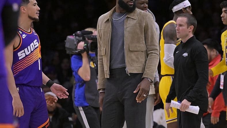 Mar 22, 2023; Los Angeles, California, USA; Los Angeles Lakers forward LeBron James (6) looks on from the bench in the second half against the Phoenix Suns at Crypto.com Arena. Mandatory Credit: Jayne Kamin-Oncea-USA TODAY Sports
