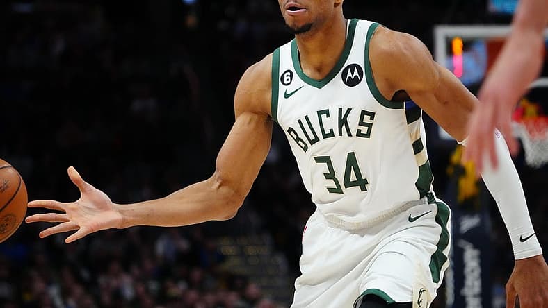 Mar 25, 2023; Denver, Colorado, USA; Milwaukee Bucks forward Giannis Antetokounmpo (34) passes the ball in the second quarter against the Denver Nuggets at Ball Arena. Mandatory Credit: Ron Chenoy-USA TODAY Sports