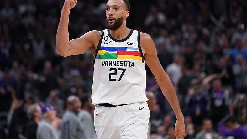 Mar 27, 2023; Sacramento, California, USA; Minnesota Timberwolves center Rudy Gobert (27) reacts after being called for a foul against the Sacramento Kings in the second quarter at the Golden 1 Center. Mandatory Credit: Cary Edmondson-USA TODAY Sports