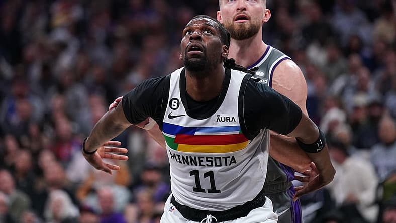 Mar 27, 2023; Sacramento, California, USA; Minnesota Timberwolves center Naz Reid (11) boxes out Sacramento Kings forward Domantas Sabonis (10) in the third quarter at the Golden 1 Center. Mandatory Credit: Cary Edmondson-USA TODAY Sports