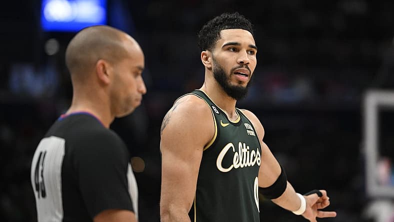 Mar 28, 2023; Washington, District of Columbia, USA; Boston Celtics forward Jayson Tatum (0) talks with referee Matt Myers (43) during the second half at Capital One Arena. Mandatory Credit: Brad Mills-USA TODAY Sports