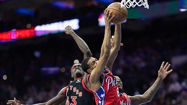Mar 31, 2023; Philadelphia, Pennsylvania, USA; Philadelphia 76ers guard De'Anthony Melton (8) rebounds the ball past Toronto Raptors forward Pascal Siakam (43) during the second quarter at Wells Fargo Center. Mandatory Credit: Bill Streicher-USA TODAY Sports