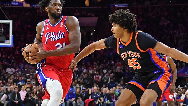 Feb 10, 2023; Philadelphia, Pennsylvania, USA; Philadelphia 76ers center Joel Embiid (21) drives to the basket against New York Knicks center Jericho Sims (45) at Wells Fargo Center. Mandatory Credit: Eric Hartline-USA TODAY Sports