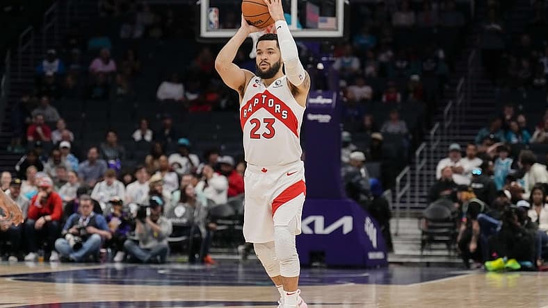 Apr 2, 2023; Charlotte, North Carolina, USA; Toronto Raptors guard Fred VanVleet (23) passes the ball off during first quarter against the Charlotte Hornets at Spectrum Center. Mandatory Credit: Jim Dedmon-USA TODAY Sports